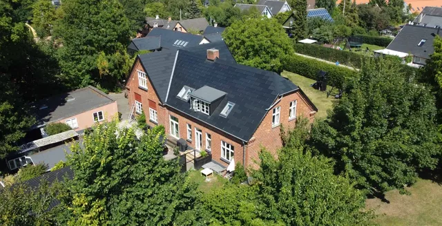 Integreret solcelletag